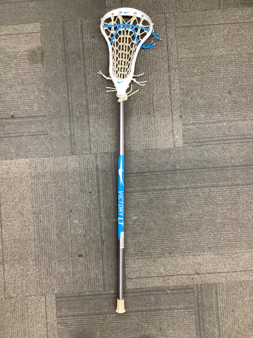 Vist Large View of Product Image Which is Used Nike VICTORY LT Wmn Atk/Mid Complete Stick Grey