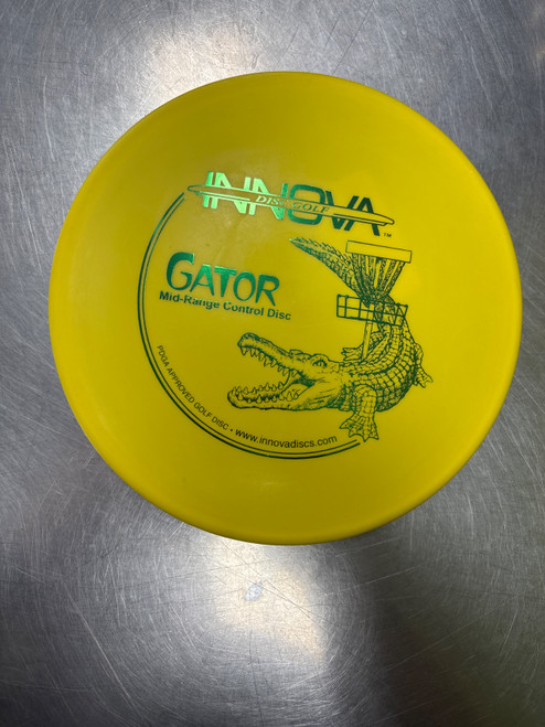 Vist Large View of Product Image Which is Used Innova DX GATOR Disc Golf Mid Range Yellow