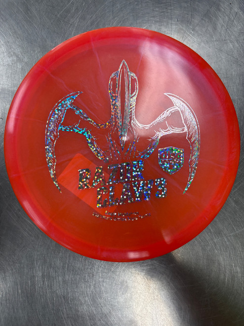 Vist Large View of Product Image Which is Used Discmania RAZOR CLAW 3 Disc Golf Putter Orange