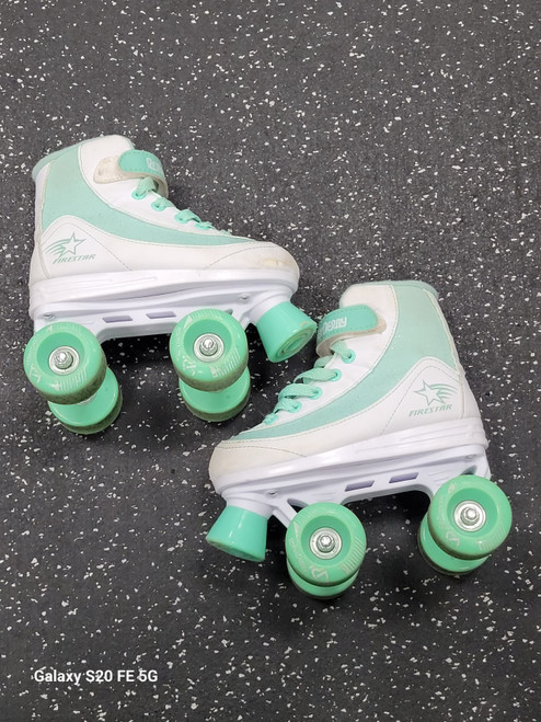 Vist Large View of Product Image Which is Used RollerDerby FIRESTAR Child Roller Quad Skates Turquoise Youth 13.0