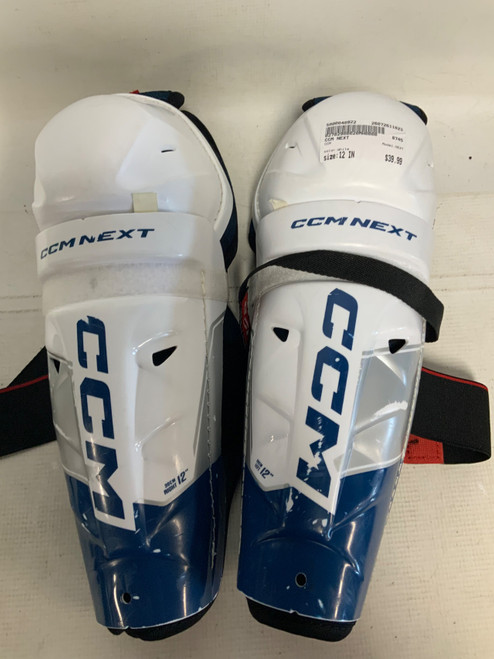 Vist Large View of Product Image Which is Used CCM NEXT Junior Shin Guards White 12"