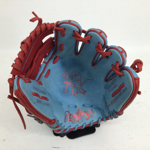 Vist Large View of Product Image Which is Used Rawlings HEART OF THE HIDE 9.5IN RHT TRAINER BB/SB Glove RH Throw Carolina Blue 9 1/2"