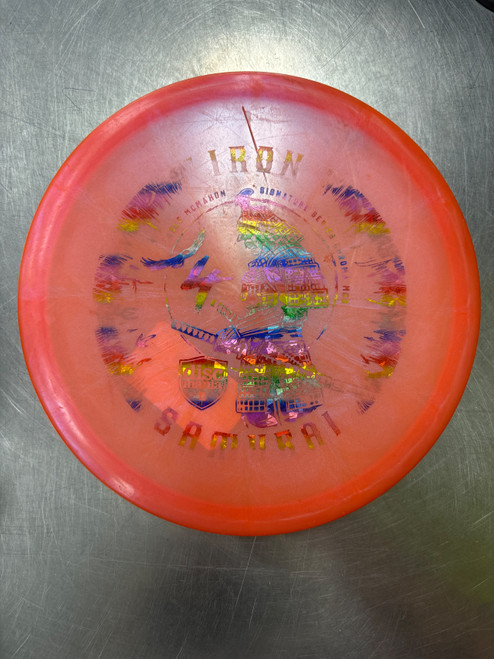 Vist Large View of Product Image Which is Used Discmania IRON SAMURAI 4 Disc Golf Mid Range Orange