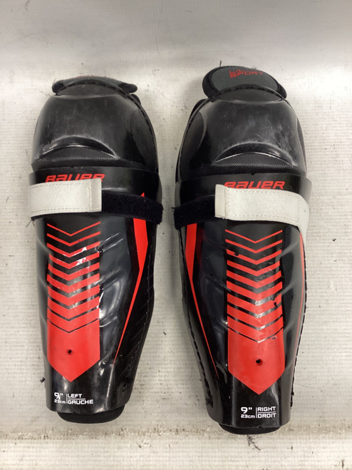 Vist Large View of Product Image Which is Used Bauer LIL SPORT Youth Shin Guards Black 9"