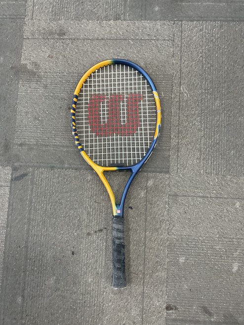 Vist Large View of Product Image Which is Used Wilson US OPEN GRAPHITE TITANIUM Adult Tennis Racquet Navy Blue 4 3/8"