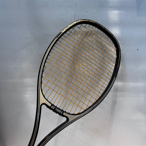 Vist Large View of Product Image Which is Used Yonex RQ260 Adult Tennis Racquet Black 4 3/8"
