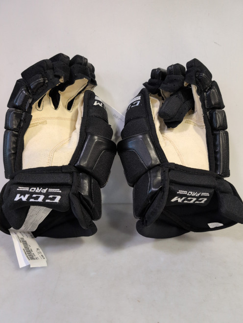 Vist Large View of Product Image Which is Used CCM PRO Senior Gloves Black 13"
