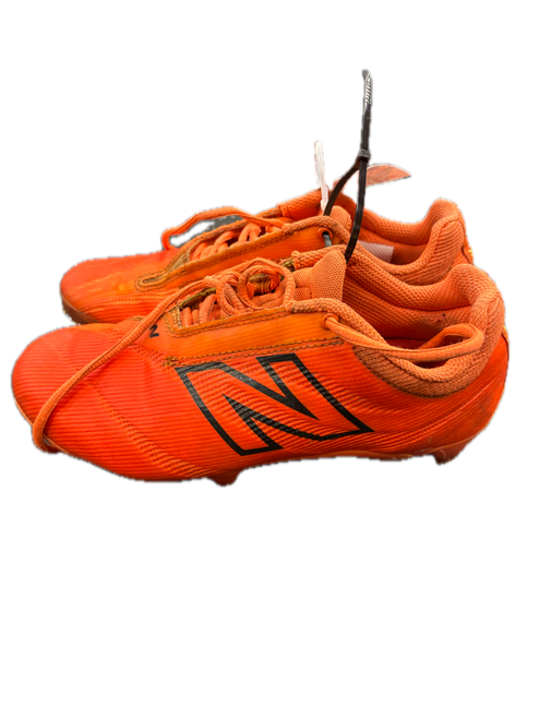 Vist Large View of Product Image Which is Used New Balance BURN LAX Cleats Boys Orange Junior 05.5