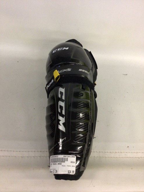 Vist Large View of Product Image Which is Used CCM TACKS 9550 Junior Shin Guards Black 11"