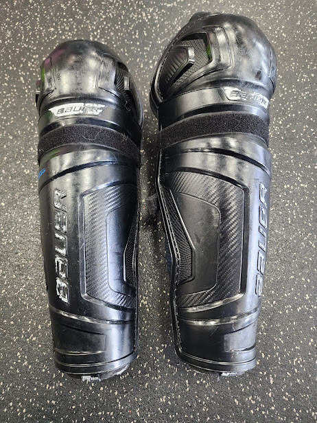 Vist Large View of Product Image Which is Used Bauer SHIN GUARDS Intermediate Shin Guards Black 14"