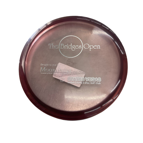 Vist Large View of Product Image Which is Used Innova THE BRIDGES OPEN Disc Golf Mid Range Red
