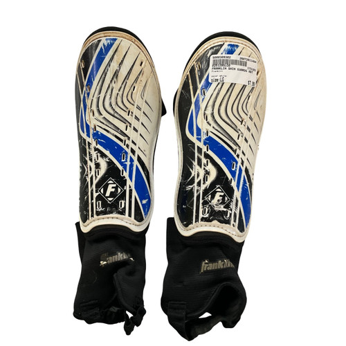 Vist Large View of Product Image Which is Used Franklin Soccer Shin Guards Adult White LG