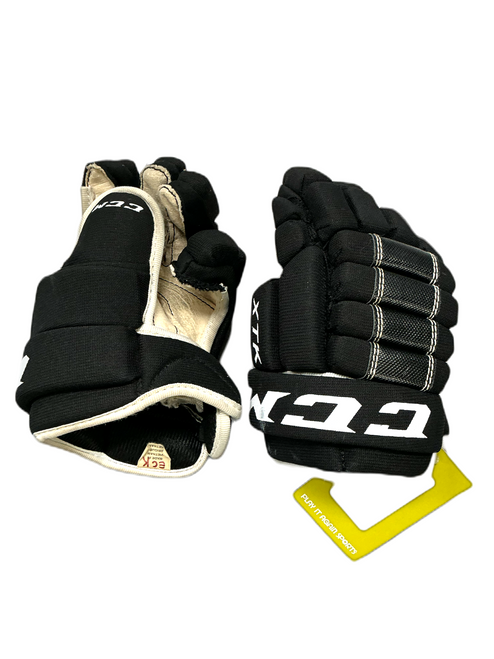 Vist Large View of Product Image Which is Used CCM XTK Youth Gloves Black 9"