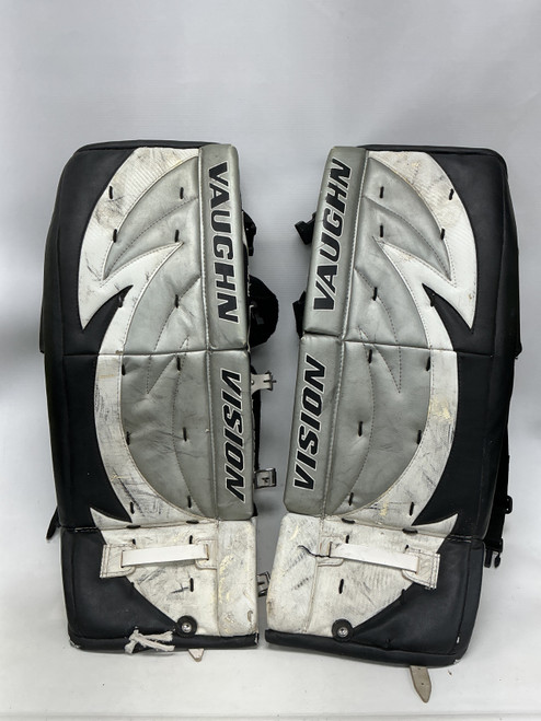 Vist Large View of Product Image Which is Used Vaughn VISION Goalie Leg Pads Junior Black And White 27"