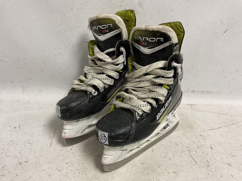 Vist Large View of Product Image Which is Used Bauer VAPOR X4 Junior Hockey Skate Black And Yellow Junior 03.5