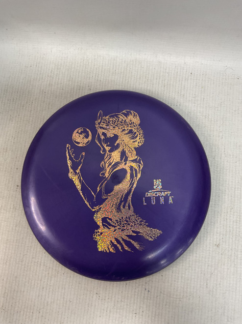 Vist Large View of Product Image Which is Used Discraft LUNA Disc Golf Mid Range Purple