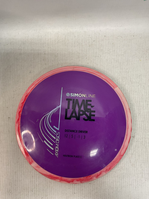 Vist Large View of Product Image Which is Used Axiom SIMONLINE TIME LAPSE Disc Golf Driver Purple