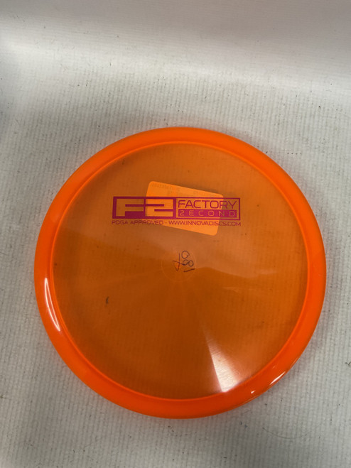 Vist Large View of Product Image Which is Used Innova FACTORY SECOND Disc Golf Mid Range Orange