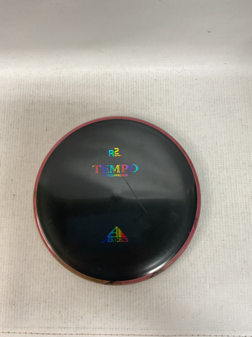 Vist Large View of Product Image Which is Used Axiom TEMPO Disc Golf Mid Range Black