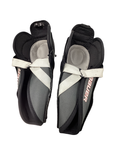 Vist Large View of Product Image Which is Used Bauer LIL SPORT Junior Shin Guards Black 9"
