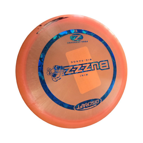Vist Large View of Product Image Which is Used Discraft BUZZZ MID RANGE MINI Disc Golf Mid Range Orange