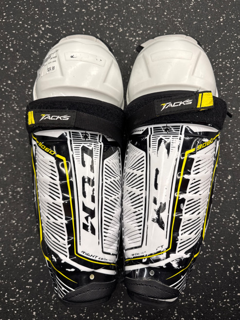 Vist Large View of Product Image Which is Used CCM TACKS 9060 Junior Shin Guards Black 11"