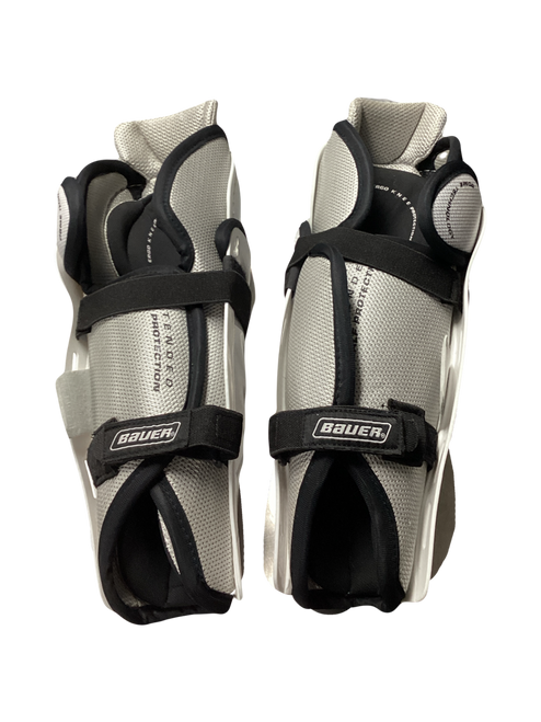 Vist Large View of Product Image Which is Used Bauer 6000 Intermediate Shin Guards White 12"