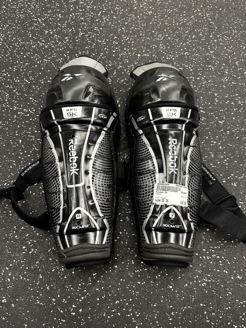 Vist Large View of Product Image Which is Used Reebok 5K Junior Shin Guards Black 12"