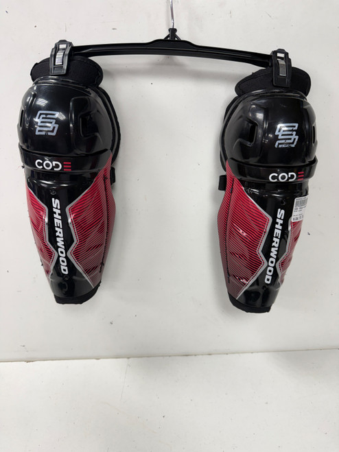 Vist Large View of Product Image Which is Used Sher-wood CODE Junior Shin Guards Black 10"