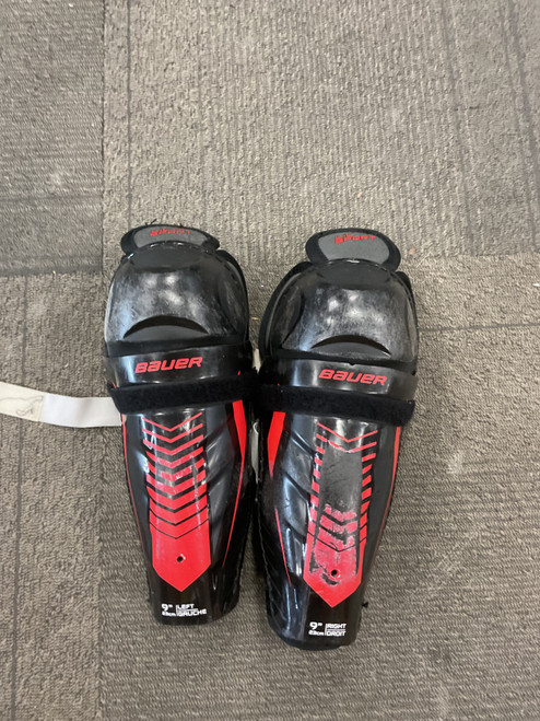 Vist Large View of Product Image Which is Used Bauer LIL SPORT Youth Shin Guards Black 9"