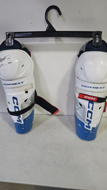 Vist Large View of Product Image Which is Used CCM NEXT Junior Shin Guards White 12"