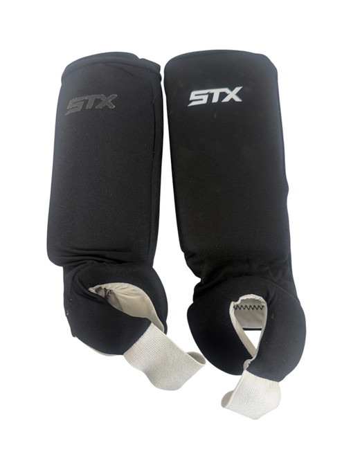 Vist Large View of Product Image Which is Used STX SG SOFT REVERSABLE FH Shin Guards Black 13"