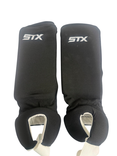 Vist Large View of Product Image Which is Used STX SG SOFT REVERSABLE FH Shin Guards Black 13"
