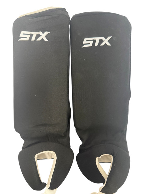 Vist Large View of Product Image Which is Used STX SG SOFT REVERSABLE FH Shin Guards Black 13"