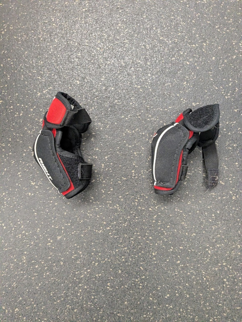 Vist Large View of Product Image Which is Used CCM YOUNG GUNS Youth Elbow Pads MD