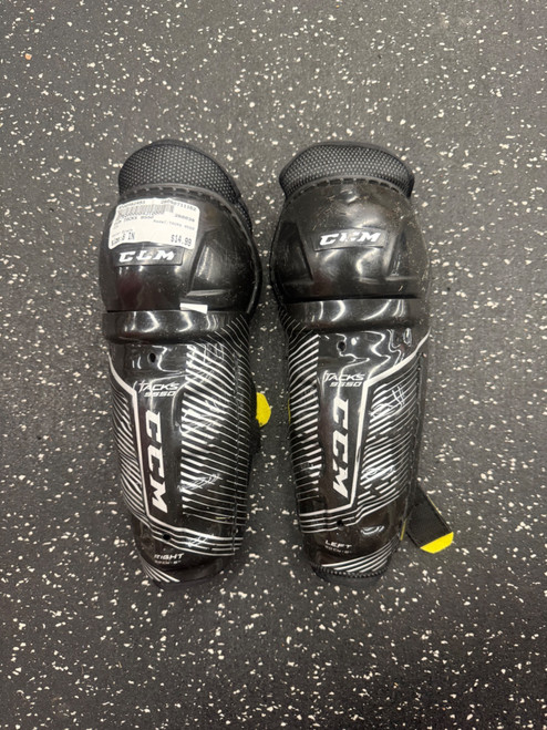 Vist Large View of Product Image Which is Used CCM TACKS 9550 Youth Shin Guards Black 8"