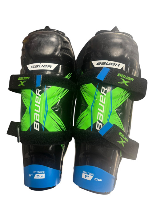 Vist Large View of Product Image Which is Used Bauer X Youth Shin Guards Black 9"