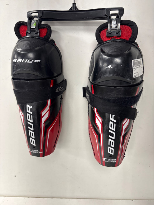 Vist Large View of Product Image Which is Used Bauer LEGACY Youth Shin Guards Black 8"