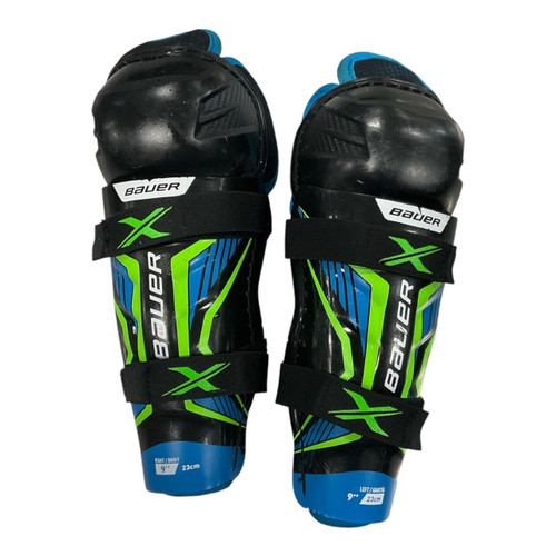 Vist Large View of Product Image Which is Used Bauer X Youth Shin Guards Black 9"