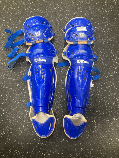 Vist Large View of Product Image Which is Used Wilson WTA4601 Catchers Leg Guards Royal Blue Adult