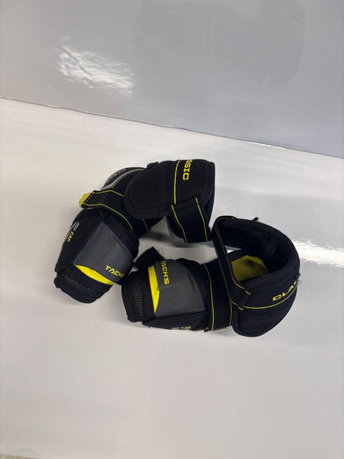 Vist Large View of Product Image Which is Used CCM TACKS CLASSIC E/P Junior Elbow Pads SM