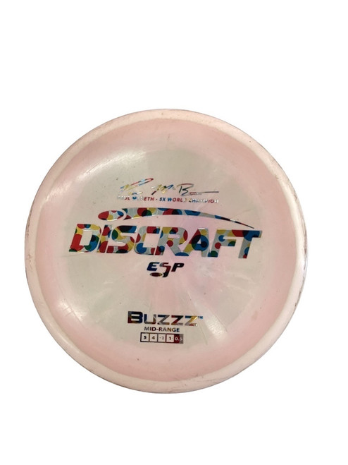 Vist Large View of Product Image Which is Used Discraft MCBETH 5X ESP BUZZZ Disc Golf Mid Range Coral