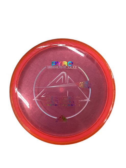 Vist Large View of Product Image Which is Used Axiom PROTON PRISM PYRO Disc Golf Mid Range Red