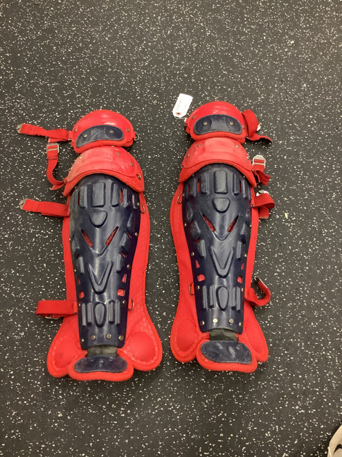 Vist Large View of Product Image Which is Used Rawlings VELO 2.0 Catchers Leg Guards Navy Blue And Red Intermed
