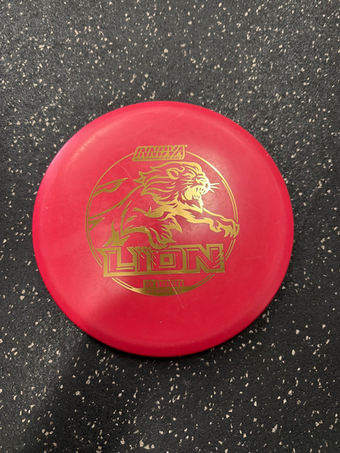 Vist Large View of Product Image Which is Used Innova DX LION Disc Golf Mid Range Red