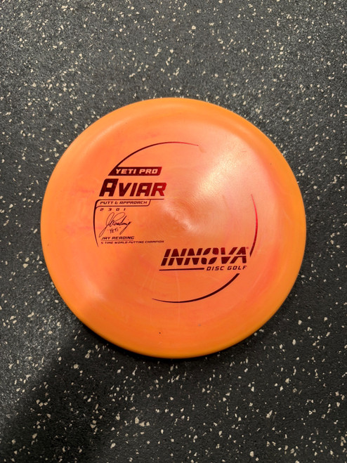 Vist Large View of Product Image Which is Used Innova YETI PRO AVIAR JR Disc Golf Putter Orange