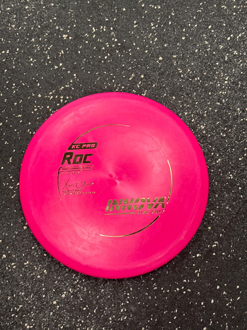 Vist Large View of Product Image Which is Used Innova KC PRO ROC Disc Golf Mid Range Pink