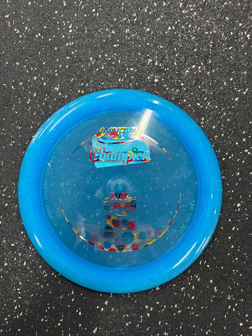 Vist Large View of Product Image Which is Used Innova CHAMPION BOSS Disc Golf Driver Royal Blue
