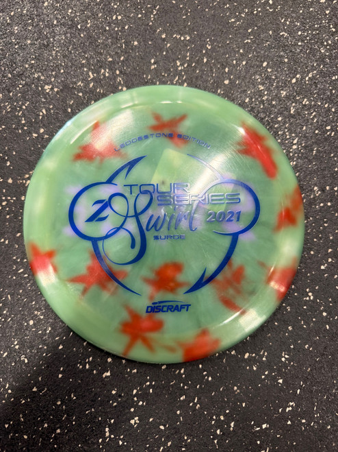 Vist Large View of Product Image Which is Used Discraft LE Z SWIRL SURGE TS 2021 Disc Golf Driver Green