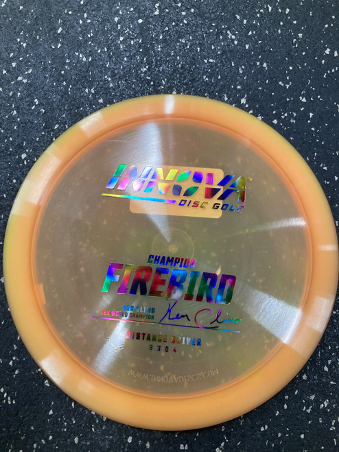 Vist Large View of Product Image Which is Used Innova CHAMPION FIREBIRD KC Disc Golf Driver Orange